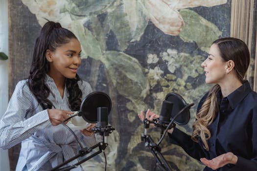 Women discussing tech in a podcast studio