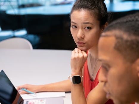 Engaged women discussing tech ideas