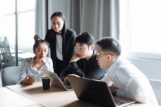 group of women discussing tech innovations