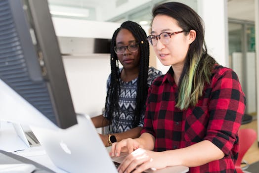 image of a woman coding in a collaborative environment