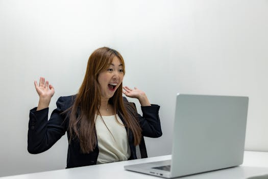 woman celebrating her tech career success